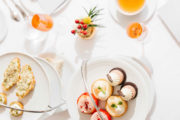 tea sandwiches and cupcakes on a table