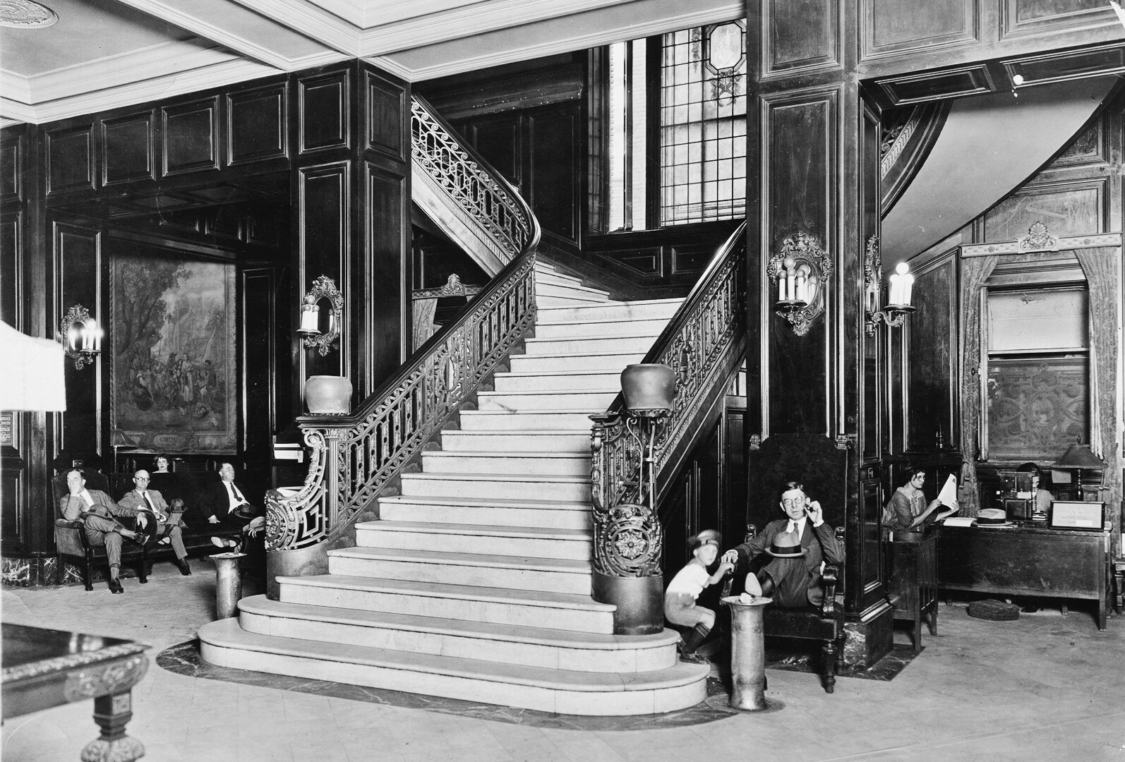 Black and white photo of The Adolphus staircase in 1920s